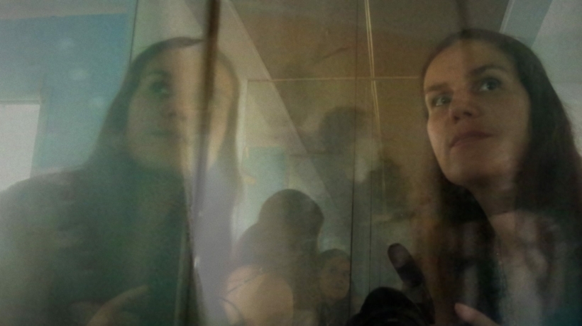 Alexandra Hidalgo considers her reflection in A Family of Stories